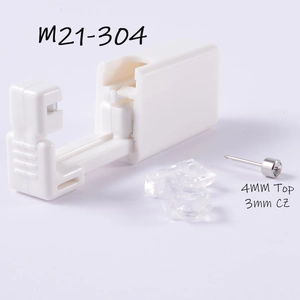 Detail of disposable piercing unit with a 3mm CZ stud and sterile plastic holder