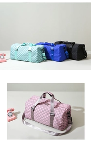 Selection of checkered travel duffel bags in light blue, dark blue, black and pink