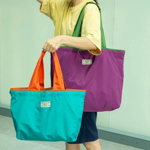 Eco-friendly foldable large capacity nylon tote bags in purple-green and blue-orange colors