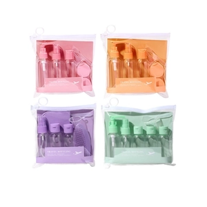 7-piece travel bottle set in four colors with portable spray and pump bottles in a clear pouch