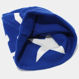 Blue knit beanie with white star pattern for winter street style and hip-hop skateboarders