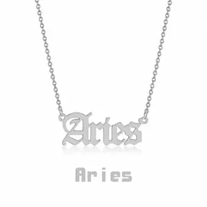 Macro shot of silver Gothic Aries pendant on fine chain necklace detail