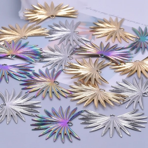 DIY palm leaf charms in gold, silver and rainbow finishes for necklace making