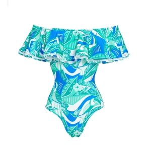 Detail of off-shoulder ruffle neckline on tropical leaf print one-piece swimsuit