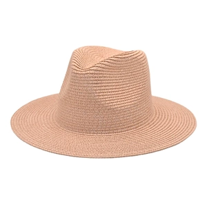 Detailed close-up showing the tight weave texture of the pink summer straw fedora hat