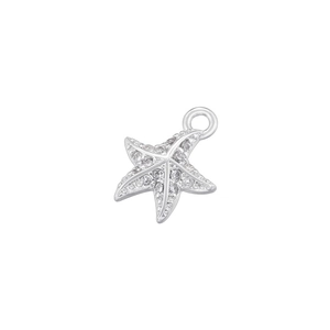 Macro shot of a silver starfish pendant with sparkling clear rhinestones for jewelry making