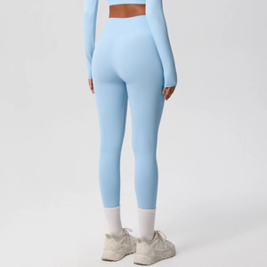 Rear view of light blue high-waisted yoga leggings showing bum lift and body shaping effect
