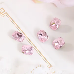 Detail showing 5 pieces of 8x10mm pink rectangle rhinestones for nail art decoration