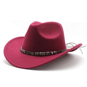Detail of burgundy felt cowboy hat featuring metal gear trim and colorful woven band