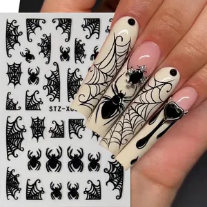 Halloween nail stickers featuring black spider and spider web designs on nails