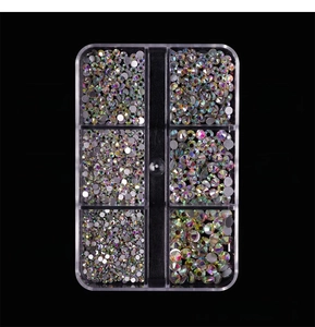 Detailed size chart for AB crystal nail rhinestones in a 6-grid container