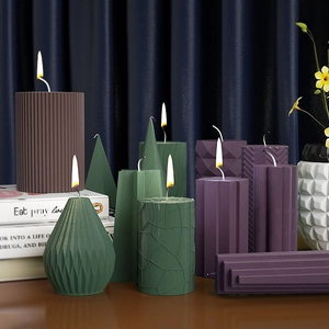 Irregular cylindrical candle molds with striped textures in various geometric shapes