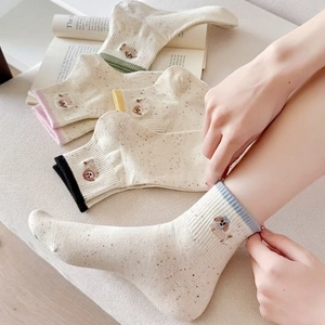 Speckled cotton crew socks for women featuring cute dog embroidery and contrast rib cuffs