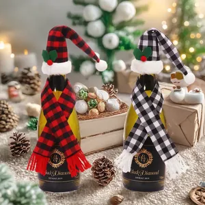 Christmas wine bottle covers with red and white plaid scarves and hats for table decor