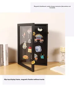 Close-up of black magnetic shadow box with wooden frame displaying cultural enamel magnets