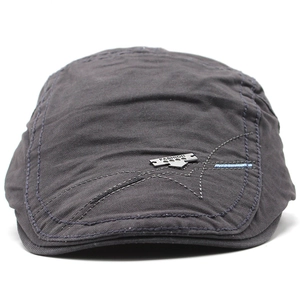Men's dark grey cotton beret flat cap with decorative stitching and metal fashion badge