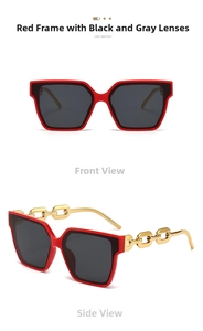 Detail view of red square frame sunglasses with golden metal chain temples for women