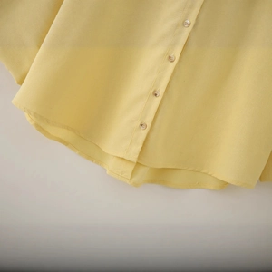 Yellow linen-blend V-neck shirt with textured fabric and off-white buttons detail