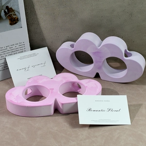 Detail of cloud-shaped double-hole silicone mold with marble texture for hydroponic vases