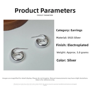 Macro shot of liquid-style S925 sterling silver earrings showing high-polished details