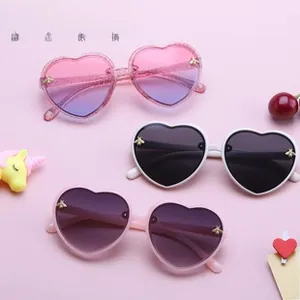 Detailed view of children's heart sunglasses with bee metal accents in various colors
