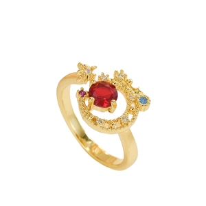 Luxury gold ring with central red stone and multi-colored gems in a geometric halo design