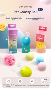 Macro detail of interactive cat toy balls showing soft plush texture and retail packaging