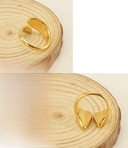 Detail of 18k gold plated stainless steel wrap ring showing the smooth polished finish