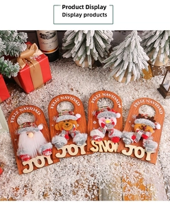 Set of four wooden Christmas door hangers with Santa and reindeer on artificial snow