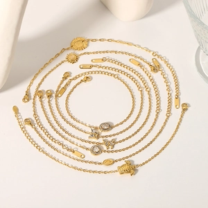 Ensemble de bracelets en acier doré 18 carats avec pendentifs tournesol et tortue