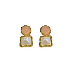 Fashionable geometric earrings with pink and white faux pearls in gold metal setting