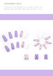 Detail of purple wavy marble press-on nails with glitter ribbons in long coffin shape