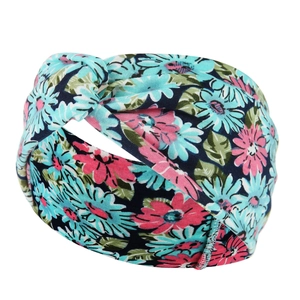 Detail of floral paisley yoga headband with blue and pink flowers on white background