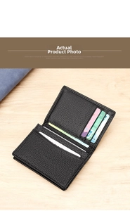 Detail view of black litchi grain leather business card holder with multiple card slots