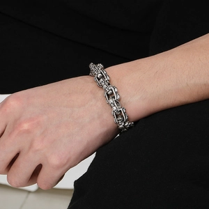 Vintage silver skull bracelet for men in retro punk style with antique finish detail