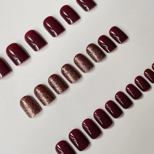 Sparkly dark red and rose gold glitter press-on nails in short square round shape