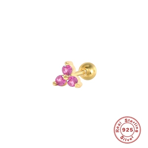 Macro shot of 925 sterling silver ear stud with three pink stones in triangle design