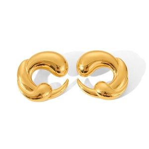 Macro shot of polished 18K gold irregular crescent stud earrings in stainless steel