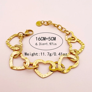 Chic gold-plated stainless steel link chain bracelet with heart charm on pink background