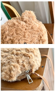 Detailed close-up of brown plush bear bag with high-quality zipper and soft long-fur texture