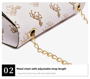 Detail of white lychee leather bag with gold chain strap and horse print pattern