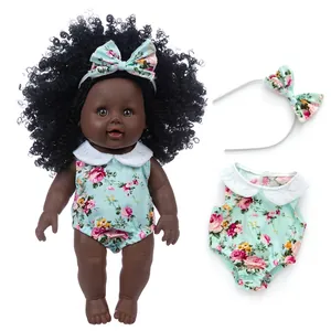 12-inch African American reborn doll with curly hair and floral mint green outfit