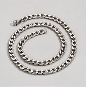 Detailed view of silver stainless steel curb chain necklace with a secure lobster clasp