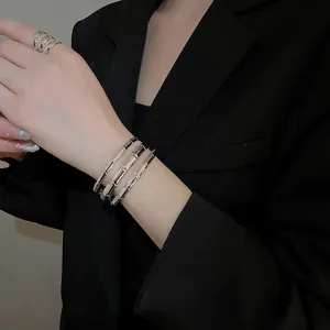 Three-layer silver bamboo texture cuff bracelet and ring set for women in minimalist style