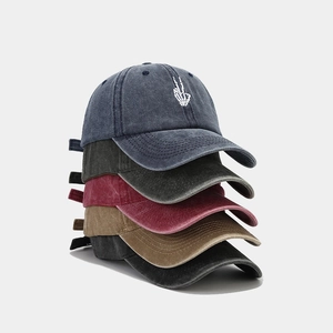 Vintage washed cotton baseball caps with skeleton hand embroidery in multiple colors
