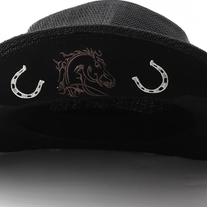 Detailed view of horse head and horseshoe embroidery on black woven straw cowboy hat