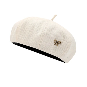 Elegant beige wool blend beret for women with a gold bow accent for autumn and winter
