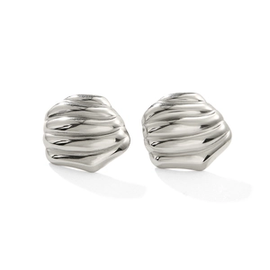 Macro detail of silver stainless steel earrings with textured shell design and polished finish