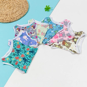 Puppy vests featuring colorful cartoon octopus, unicorn, and bear prints on cotton fabric