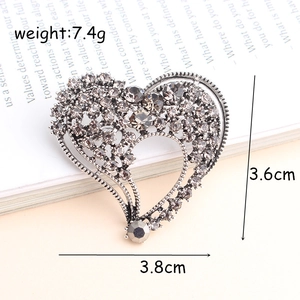 Hollow heart safety pin brooch with grey crystals and vintage silver finish